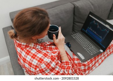 Woman Working From Home During Pandemia, Talking On The Phone And Drinking Coffee
