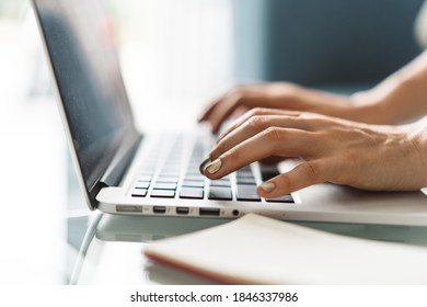 Woman working from home, hands on keyboard closeup - Shutterstock ID 1846337986