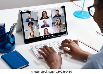 Woman Working From Home Having Group Videoconference On Laptop - Shutterstock ID 1692360430