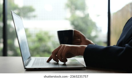Woman working at home office hand on keyboard close up. - Shutterstock ID 2365231757