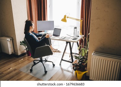 Woman Working At Home. Telework On Laptop