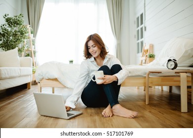 Woman Working At Modern Home Office.