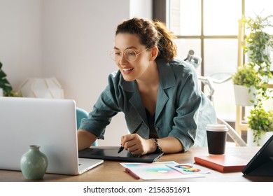 Woman Is Working In The Office. Concept Of Small Business.