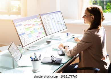 Woman Working On Calendar Agenda Schedule On Computer