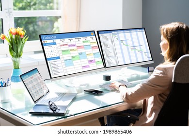 Woman Working On Calendar Agenda Schedule On Computer