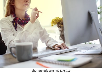 Woman Working On Computer