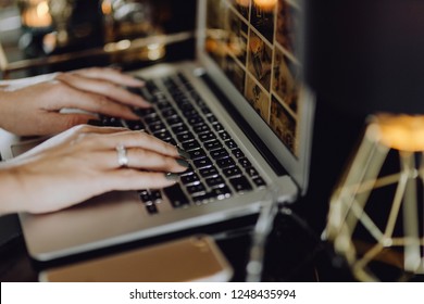 Woman working on her blog in a laptop - Shutterstock ID 1248435994
