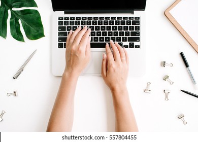 Woman working on laptop. Flat lay, top view workspace