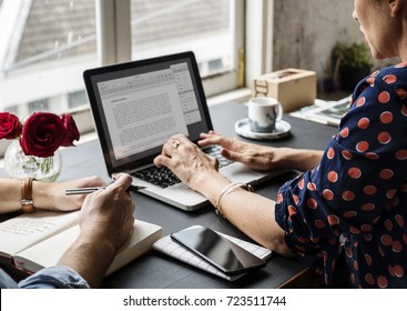 Woman Working On Laptop Typing Essay Information