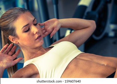 Woman Working Out In Fitness - Active Girl Professional Fitness Cometrtitor Doing Abs Aexercise In Gym Club