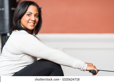 Woman Working Out In A Gym At Home