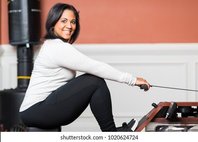 Woman Working Out In A Gym At Home