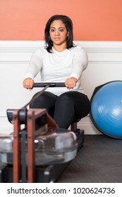 Woman Working Out In A Gym At Home