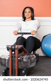 Woman Working Out In A Gym At Home