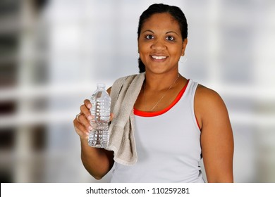 Woman Working Out While At The Gym