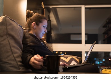 Woman Working Overnight At Home