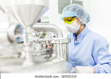 Woman working at the pharmaceutical factory. Shallow DOFF and 'high key' effect. See more images and video from this series. 
