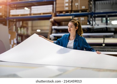 Woman Working In Printing Factory
