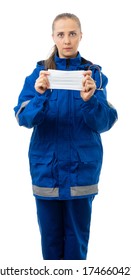 Woman Works On An Ambulance. Rescue Girl Holds A Protective Mask And Looks At Us Sternly. Isolated, White Background.