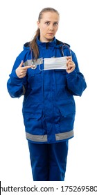 Woman Works On An Ambulance. The Rescue Girl Is Holding A Protective Mask And Is Looking At Us Sternly. The Doctor Points A Finger At The Mask. Isolated, White Background.