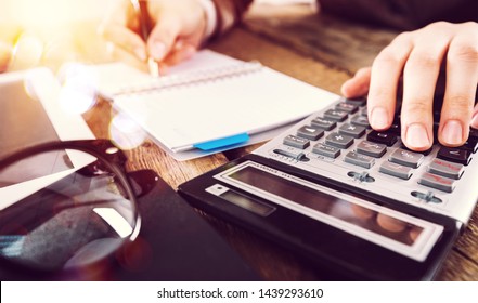 Woman works on a calculator