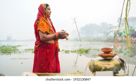 Woman Worshipping During Chhath Pooja