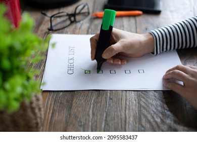 Woman Writing To Check List