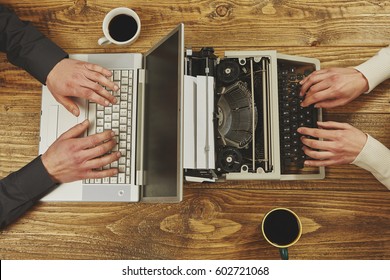 Woman writing on a typewriter and a man working on a laptop.Closeup to hands.Technological evolution. - Shutterstock ID 602721068