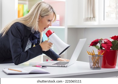 Woman Yelling To Her Computer On Megaphone