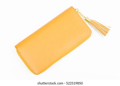 Woman Yellow Purse Isolated On The White Background. Closeup Of Modern Yellow Leather Wallet Over White Background. Top View On The Wallet.