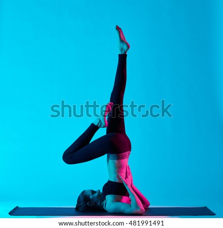 Similar – Woman doing a handstand on the beach