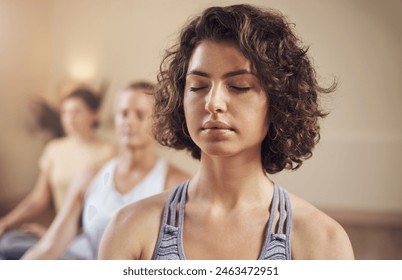 Woman, yoga and eyes closed with group for meditation, relax and zen for holistic health. Female person, instructor and spiritual for exercise, wellness and mindfulness for balance and calm together - Powered by Shutterstock