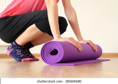 Woman With Yoga Mat