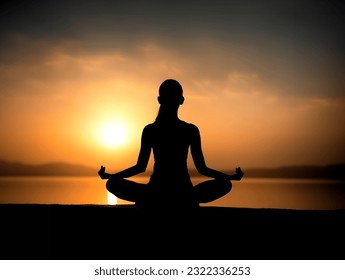 Woman in Yoga pose position with serene sun set over ocean. - Powered by Shutterstock