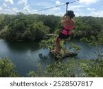 woman zip lining in Mexico