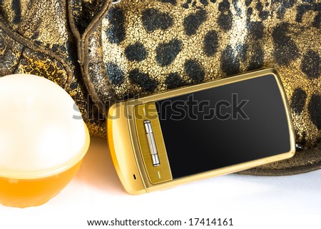 womanish handbag, perfume and mobile phone