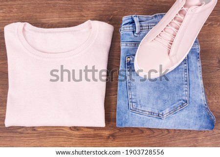 Similar – Image, Stock Photo pink textile shoes and other items for fitness
