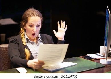 A Woman-reception Hotel Worker Reading Negative News In Letter. Shocked Beauty Girl Business Manager Received Layoff Message Letter From Company Feeling Surprised. An Agitated Girl Without Joy.