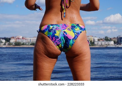 Woman's backside on the beach