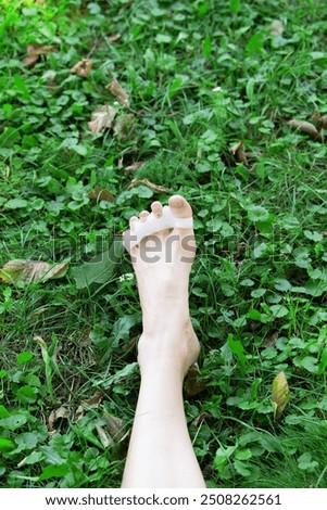 Image, Stock Photo Women’s feet barefoot with bow tie