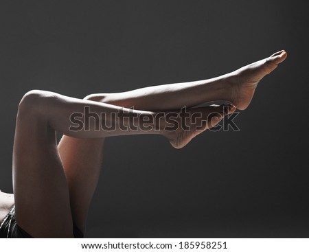 Woman's bare legs (low section)