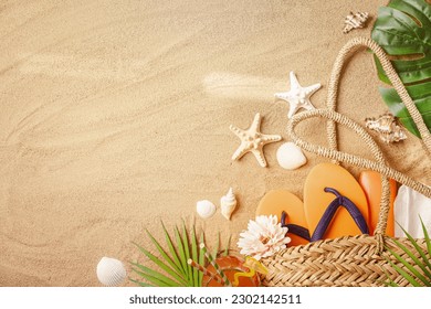 Woman's beach accessories bag, straw hat, flip flops, shells, sunglasses, palm leaves on sand background. Exotic, tropical mood. Summer vacation, travel concept. Flat lay. Copy space. - Powered by Shutterstock