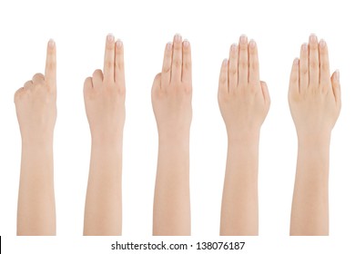 Woman's beautiful naked hand shows with fingers from one to five on a white background.