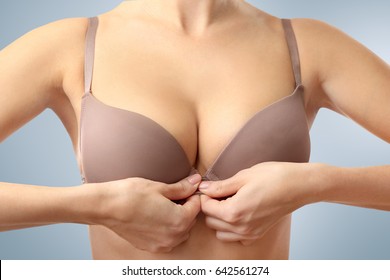 Woman's breast, closeup. Plastic correction and surgery concept