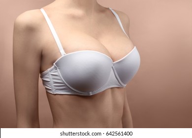 Woman's breast, closeup. Plastic correction and surgery concept