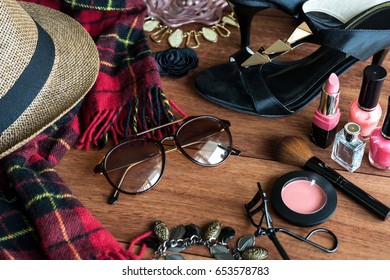woman's dressing table with cosmetics set and fashion accessories