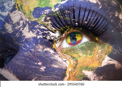 Womans Face With Planet Earth Texture And Ethiopian Flag Inside The Eye. Elements Of This Image Furnished By NASA.