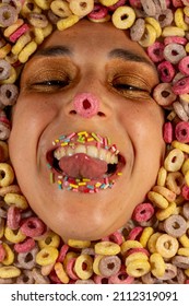 Woman's Face Surrounded By Colored Sugary Cereals And Candies On Her Lips