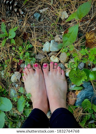 woman's feet grounding in nature