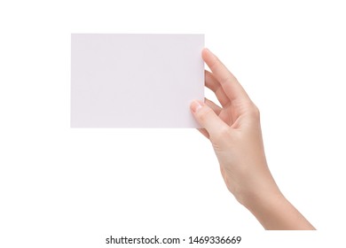 Woman's (female) Hand Holding An Empty Horisontal Card (blank, Paper, Postcard) Isolated On The White Background